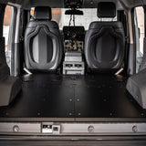 Buzz Overland Buzz Base for INEOS Grenadier, a 36kg 5052 aluminium deck replacing 56kg factory seats, with access hatches for stealth overlanding and roof conversions.